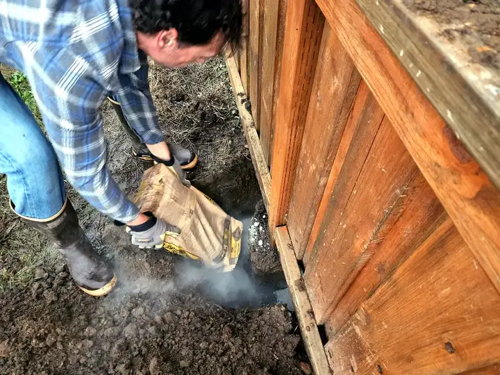 Setting a fence post in concrete