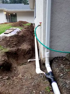 Downspout tie-in