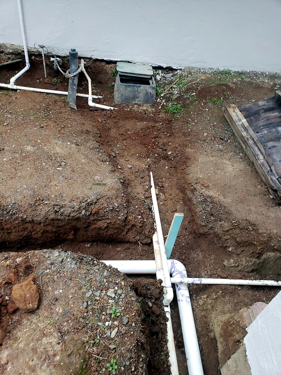 Detail of a drainage line and fittings installed by SeaBreeze