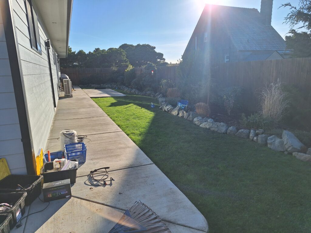Clean backyard with a green grass